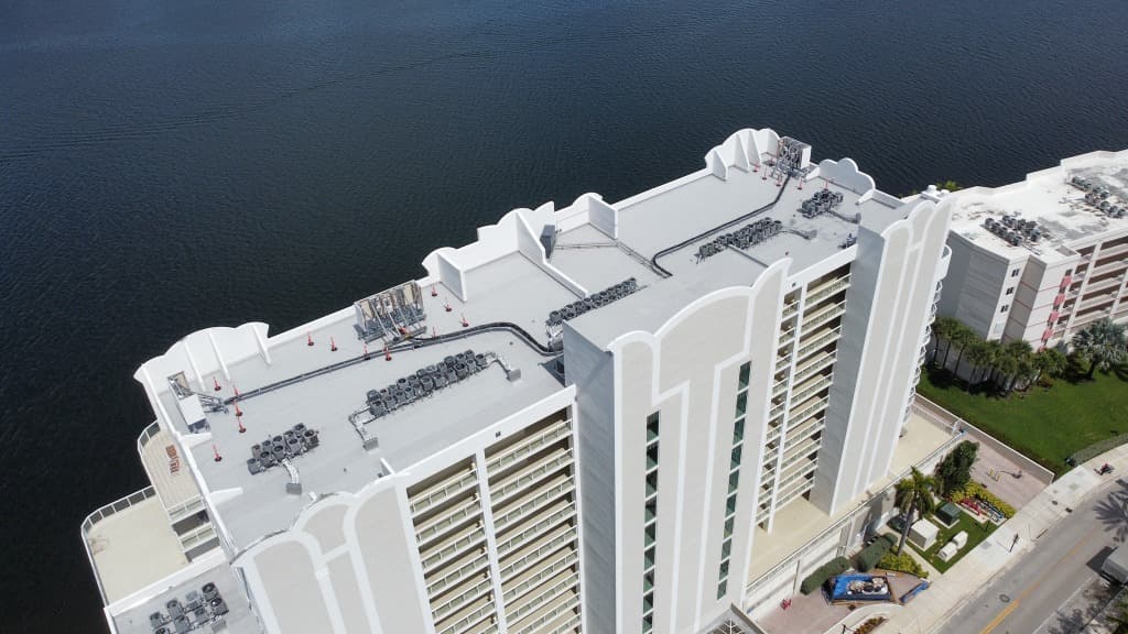 Aerial Drone View of High-Rise Building Flat Roof featuring Modified Bitumen