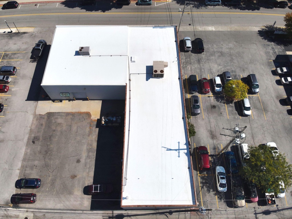 L-Shaped Commercial Building Flat White PVC Roof